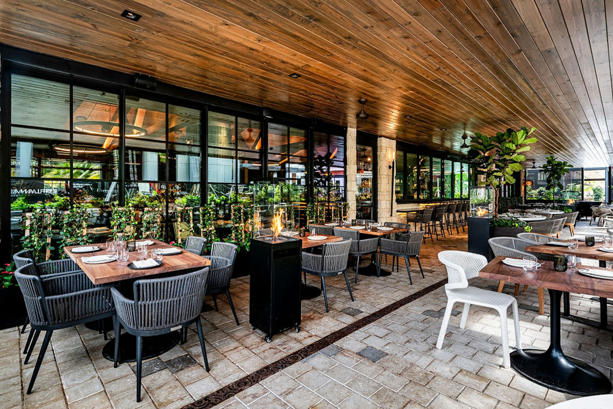 Covered patio surrounded by tropical greenery
